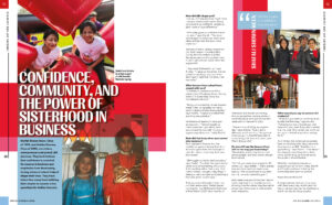 Two women in white T-shirts smile on a red inflatable structure during a fundraising day, with the bold headline 'Confidence, Community, and the Power of Sisterhood in Business' across the page.
